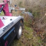 Big Mike’s Wrecker Service tow truck performing vehicle towing in Palestine TX